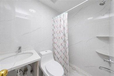 Exceptional, fully renovated legal two-family brick property - photo 18