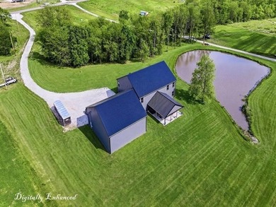 Tucked behind a grove of mature trees, this 4-bedroom - photo 3