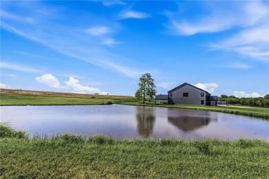 Tucked behind a grove of mature trees, this 4-bedroom - photo 4