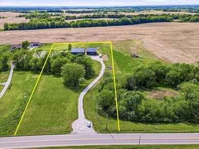 Tucked behind a grove of mature trees, this 4-bedroom - photo 5