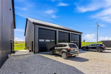 Tucked behind a grove of mature trees, this 4-bedroom - photo 7