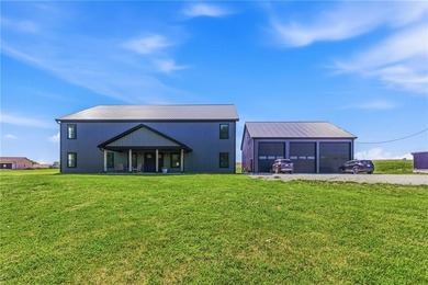 Tucked behind a grove of mature trees, this 4-bedroom - photo 10