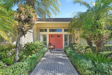 Charming 3BR, 2BA, 2CG +cart home is perfectly situated on a - photo 1