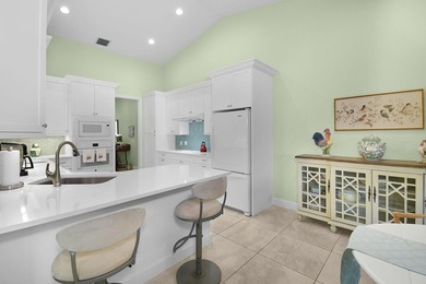 Charming 3BR, 2BA, 2CG +cart home is perfectly situated on a - photo 6