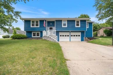 Step inside this beautifully updated split-level home where - photo 1