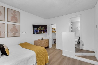 Discover one of Key Colony's most coveted floor plans in the - photo 12