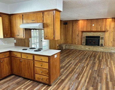 GREAT HOME WITH LOT OF UPDATES. NICE SHADED LOT, COVERED BACK