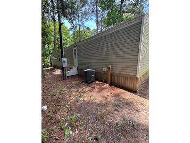 Enjoy easy lake living in this well-kept 2020 single wide mobile - photo 13