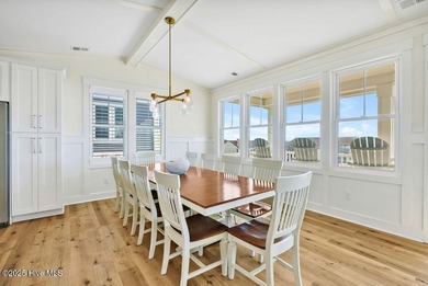 Welcome to 1408 E Beach Drive, where every sunrise feels close