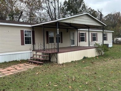 LARGE DOUBLE-WIDE HOME ON NEARLY HALF AN ACRE AND LESS THAN A - photo 1