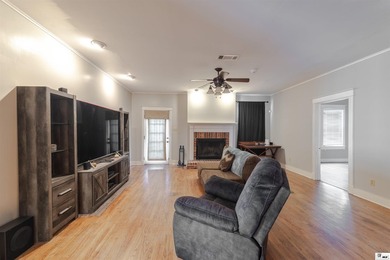 Welcome to this charming 3-bedroom, 2-bath home nestled in the - photo 2