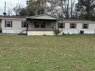 LARGE DOUBLE-WIDE HOME ON NEARLY HALF AN ACRE AND LESS THAN A - photo 2