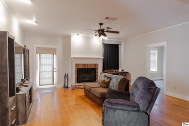 Welcome to this charming 3-bedroom, 2-bath home nestled in the - photo 3