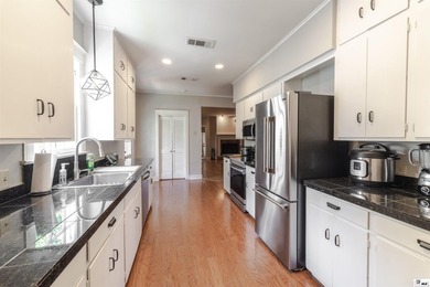 Welcome to this charming 3-bedroom, 2-bath home nestled in the - photo 5
