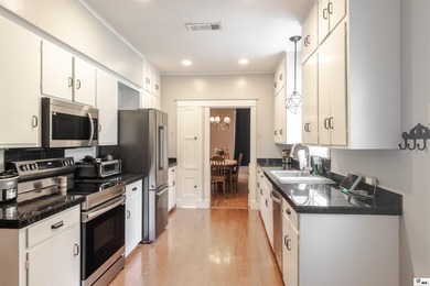 Welcome to this charming 3-bedroom, 2-bath home nestled in the - photo 6