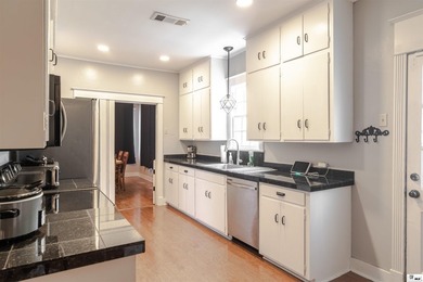 Welcome to this charming 3-bedroom, 2-bath home nestled in the - photo 7