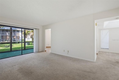 This 2 bedroom, 2 bathroom first floor condo is conveniently - photo 3