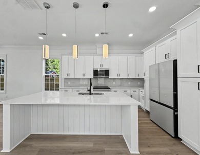 Welcome to 1988 Irving Avenue, a beautifully crafted new - photo 7