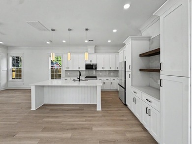 Welcome to 1988 Irving Avenue, a beautifully crafted new - photo 8
