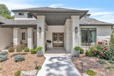 Come home to luxury and tranquility just across the river in the - photo 2