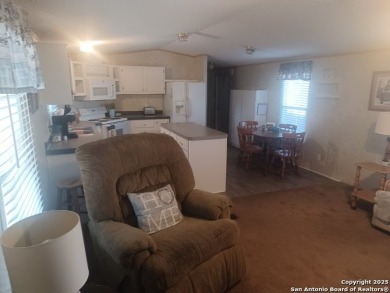 Cute, well maintained 3 bd./2 bath single wide mobile home on .2