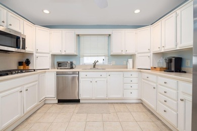 Welcome to 6 4th Avenue, a classic beach retreat just steps from - photo 8