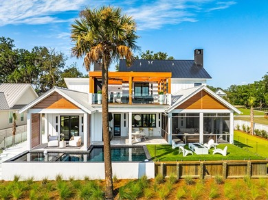 Modern coastal luxury awaits at 4017 Kaolin Street, a - photo 1
