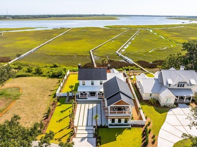 Modern coastal luxury awaits at 4017 Kaolin Street, a - photo 2