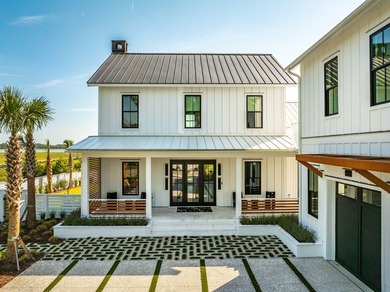Modern coastal luxury awaits at 4017 Kaolin Street, a - photo 6