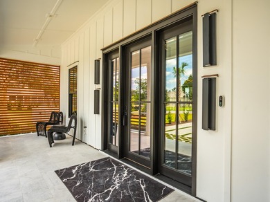 Modern coastal luxury awaits at 4017 Kaolin Street, a - photo 7