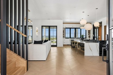 Modern coastal luxury awaits at 4017 Kaolin Street, a - photo 8