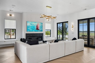 Modern coastal luxury awaits at 4017 Kaolin Street, a - photo 10