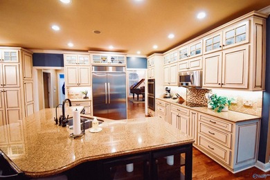Experience golf course living in this beautifully positioned - photo 17