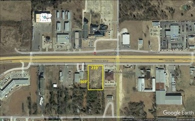 Excellent commercial lot along Shawnee Bypass (Highway 62) in - photo 1