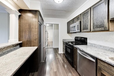 This beautifully updated 1-bedroom, 1-bath condo in - photo 8