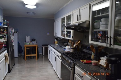 Located in the Village South Subdivision, this 5-bedroom, 3-bath - photo 6