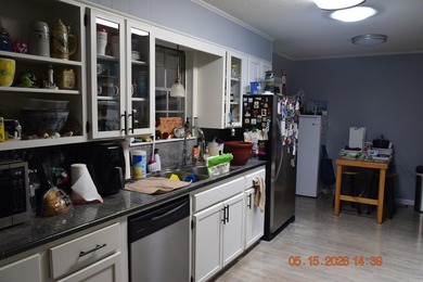 Located in the Village South Subdivision, this 5-bedroom, 3-bath - photo 7