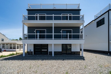 Experience luxury coastal living in this new construction - photo 6
