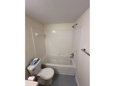 This cozy 1/1 condo features an open living/dining area with a - photo 11