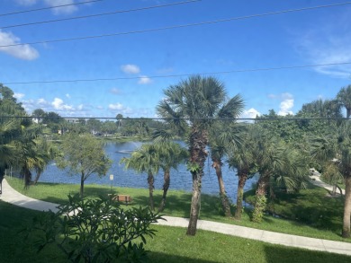 Lake Condo For Sale in Palm Springs, Florida