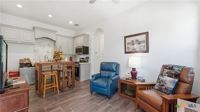 Welcome to luxury Hill Country living in gated Rockin J Ranch - photo 29