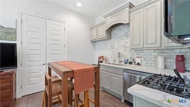 Welcome to luxury Hill Country living in gated Rockin J Ranch - photo 31