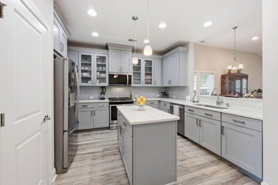Nestled on a picturesque cul-de-sac, this exceptional, freshly - photo 6