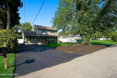 The one you've been waiting for! This 4-bedroom, 2-bath home is - photo 2