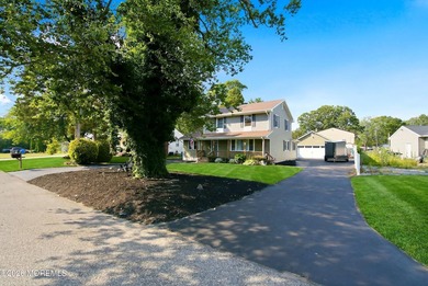 The one you've been waiting for! This 4-bedroom, 2-bath home is - photo 3