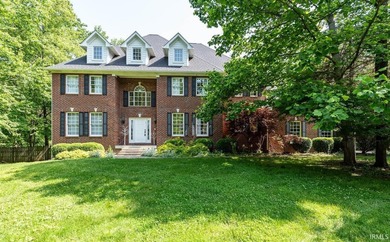 Consider this pristine brick home your ideal retreat at the end - photo 2
