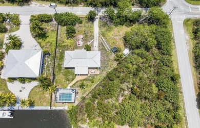 Nestled in the heart of Big Pine Key, this private canal-front - photo 2