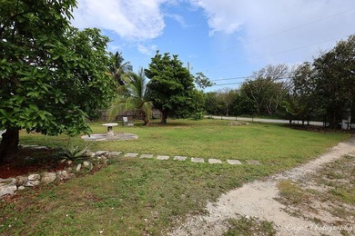 Nestled in the heart of Big Pine Key, this private canal-front - photo 8