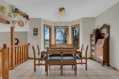 Set on 136 feet of shoreline on desirable Lake Ida, this 4 - photo 14