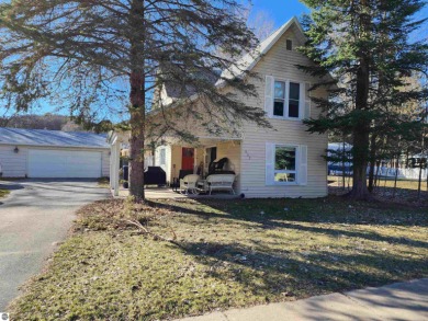 Antrim County Chain of Lakes Home For Sale in Bellaire Michigan